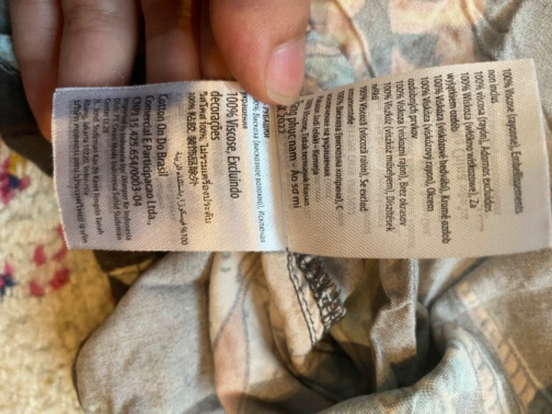 tropical print button-up shirt to be a vacation dad