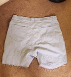 distressed light wash denim shorts
