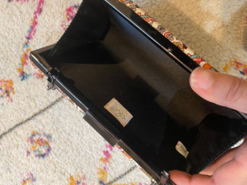 paisley print clutch bag with chain