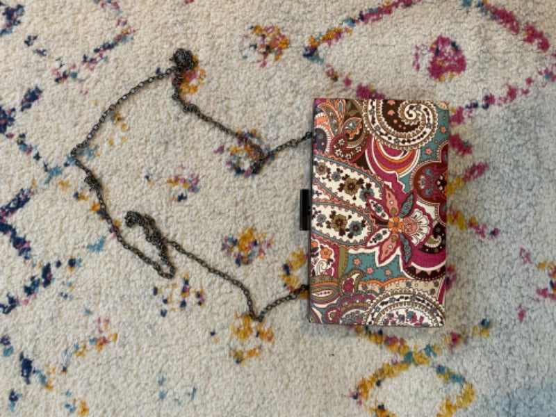 paisley print clutch bag with chain