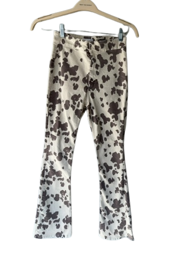 rodeo time! brown cow print flared pants