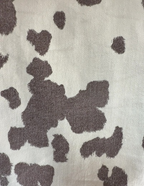 rodeo time! brown cow print flared pants