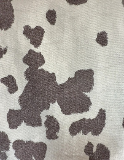 rodeo time! brown cow print flared pants