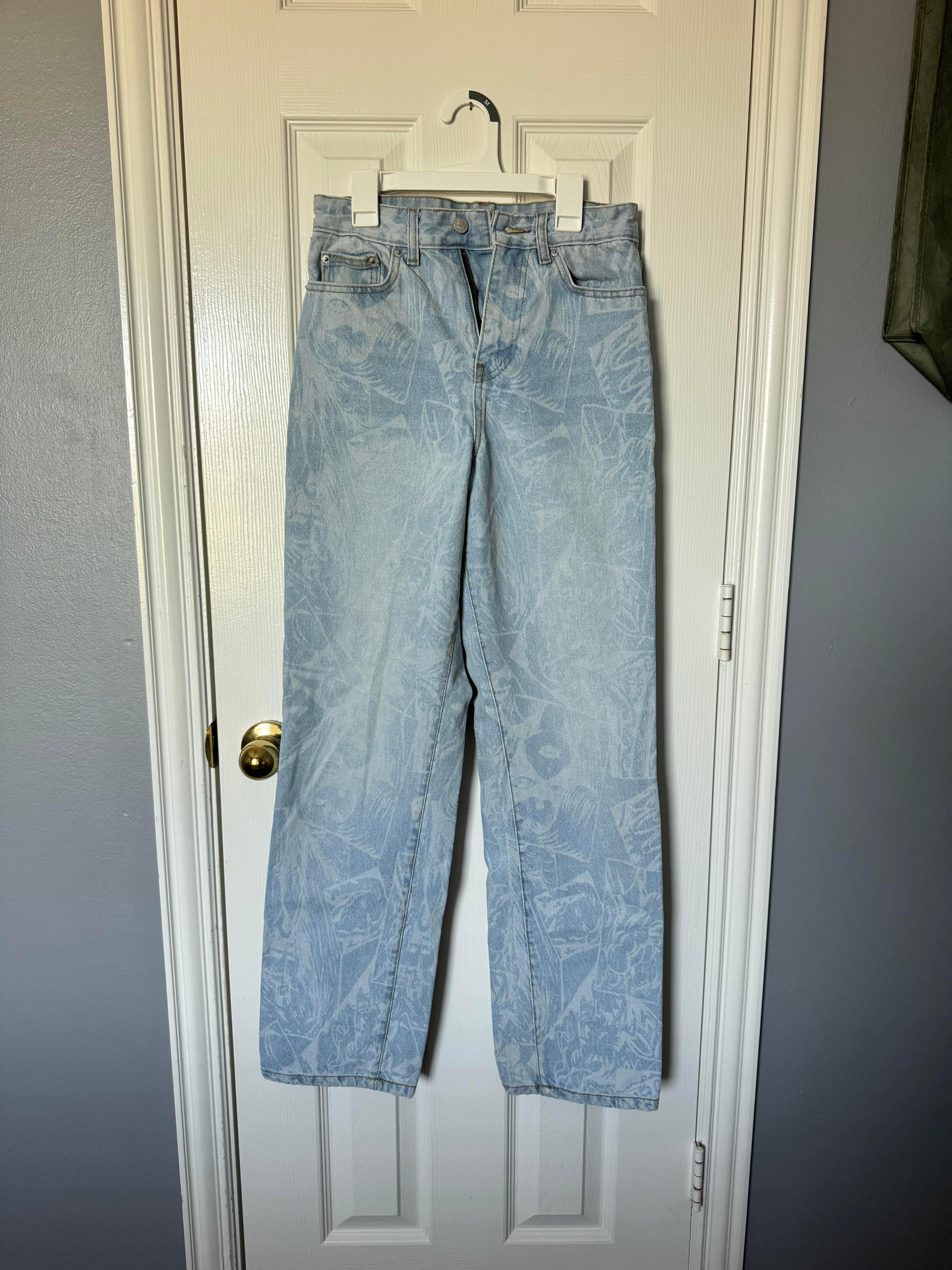 light fade jeans with faint marbling pattern