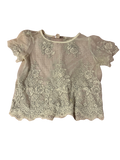 white embroidered lace top with detailed hem