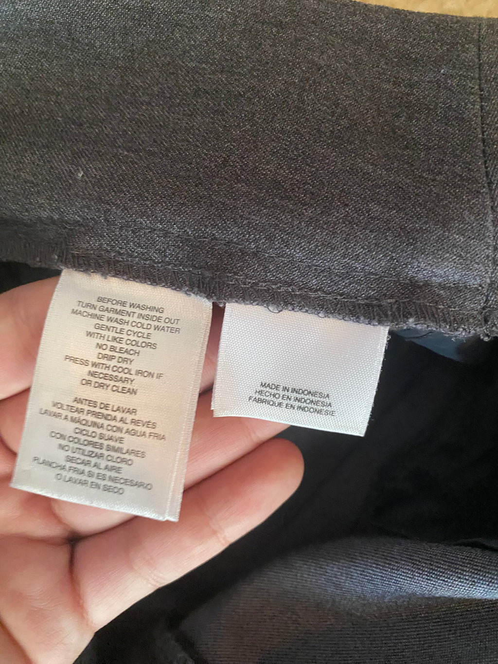 gray dress pants with gold buttons