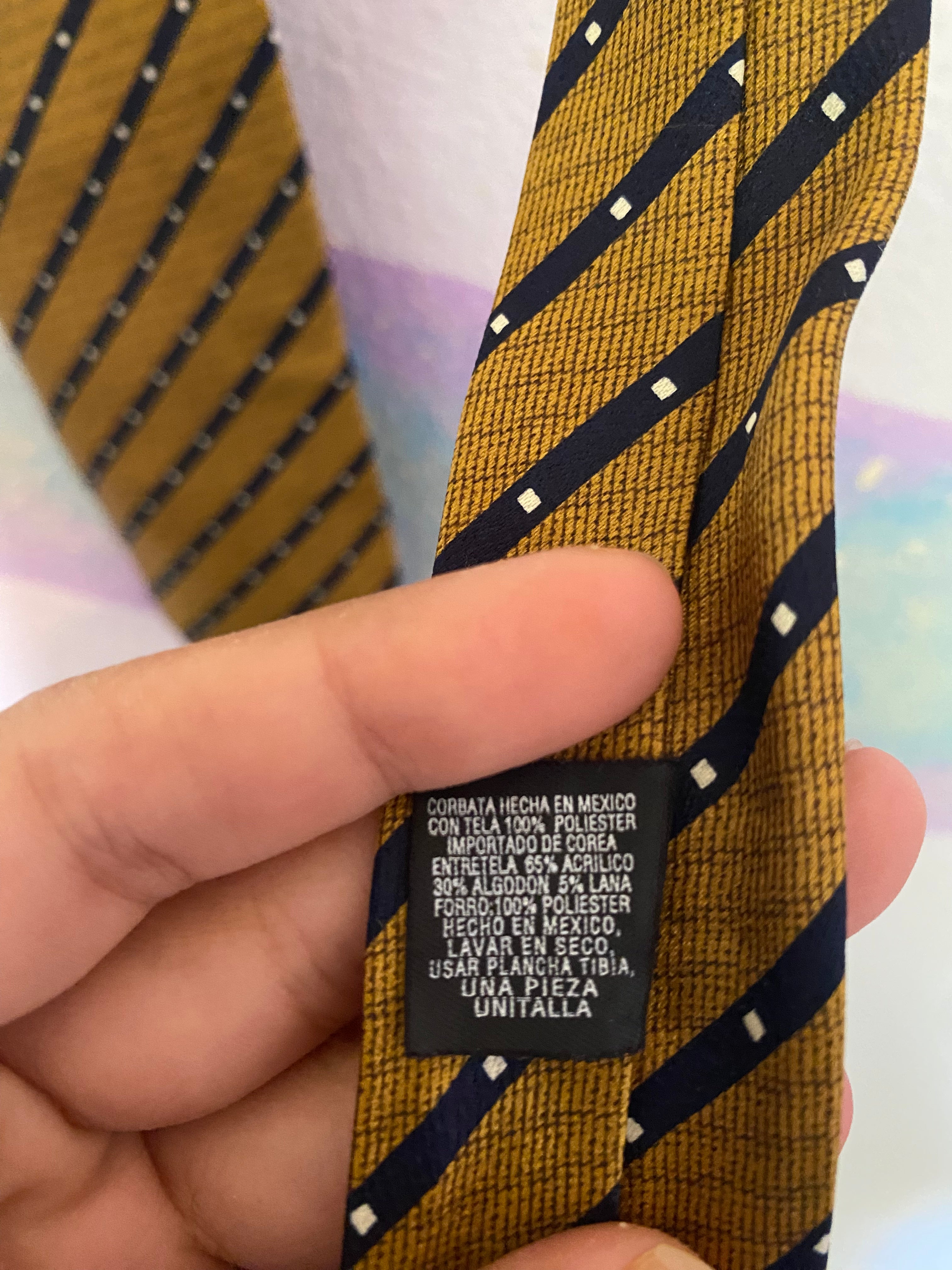 gold and navy diagonal stripe tie
