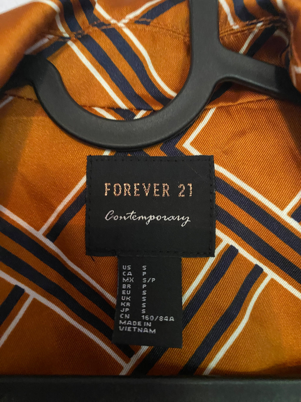 funky geometric orange and blue jacket